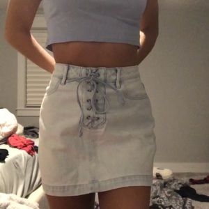Denim skirt laced up in the front.